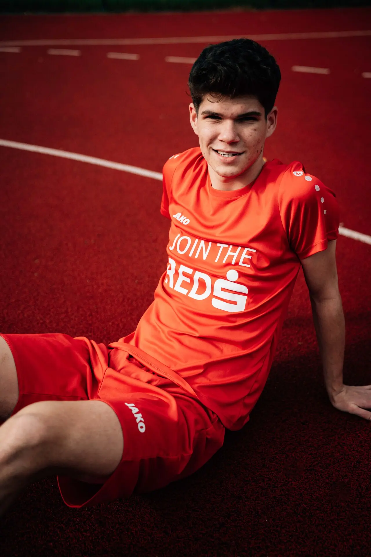 Fussballspieler Sitzend Portrait Laufbahn